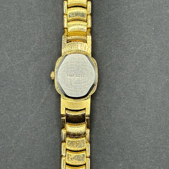 Ronica gold tone ladies watch with rhinestone accents. - Picture 4 of 5